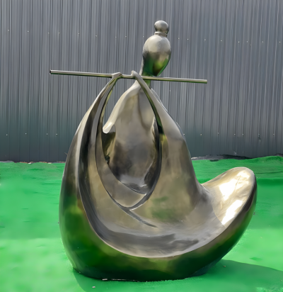 玻璃鋼仿銅抽象吹笛子的人物景觀雕塑